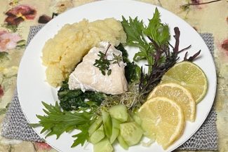 lightly poached cod with creamy mashed potato and buttered spinach