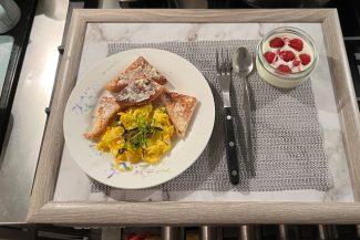 petite scrambled egg and toast with berries and kefir dessert